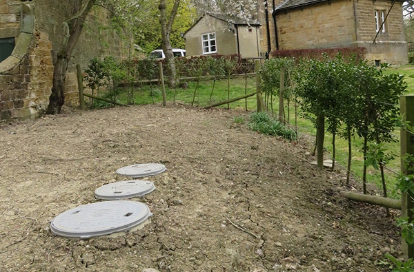 Replacing a non-compliant septic tank with a new FujiClean sewage treatment plant for discharge to the local watercourse.